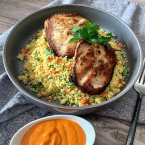 Seared Chicken Breasts with Romesco Sauce and Mediterranean Couscous