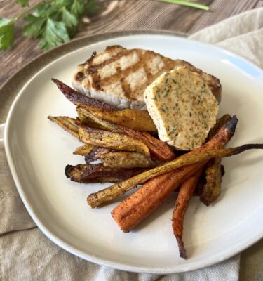 Grilled Pork Chop with Chili Lime Butter & Sumac Roasted Rainbow Carrots