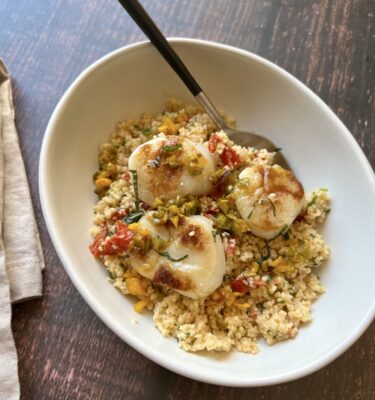 Seared Scallops over Sundried Tomato Preserved Lemon Couscous