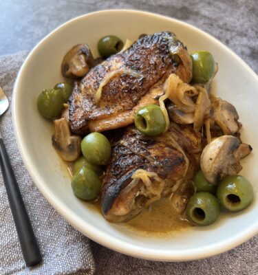 Braised Chicken Thighs with Castelveltrano Olives and Mushrooms